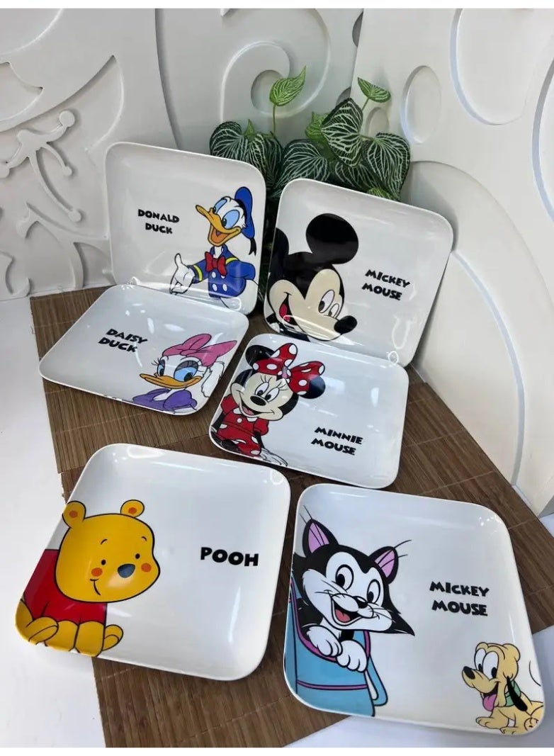 This rectangular plastic plate is made from durable and lightweight plastic and decorated with fun Disney cartoon designs, making mealtime more enjoyable for kids. - Image 1