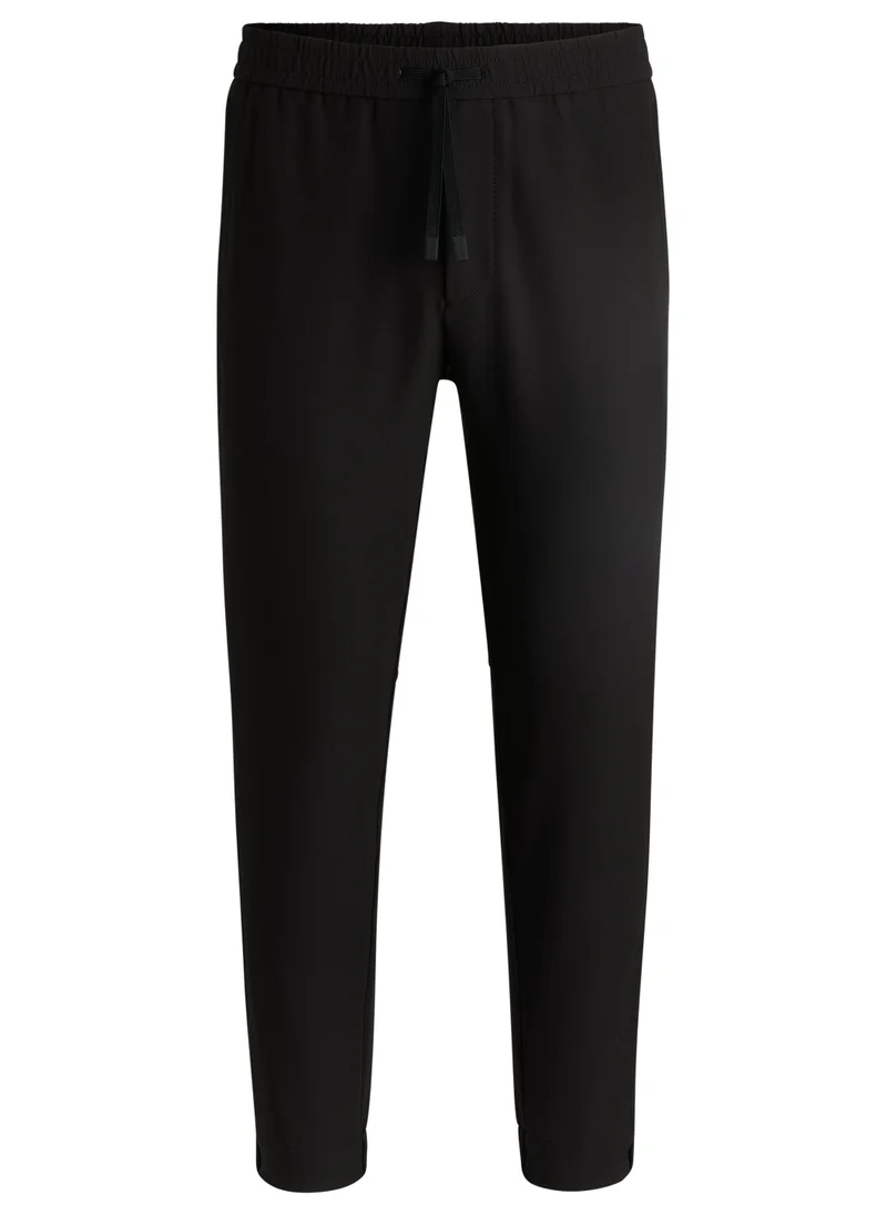 بوس Tapered-fit trousers in water-repellent stretch fabric