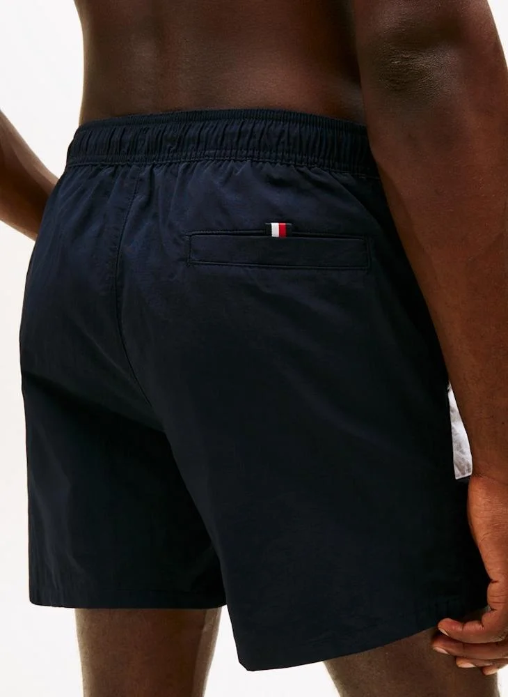 TOMMY HILFIGER  Classic Colour-Blocked Mid Length Swim Shorts for Men | Best Price UAE