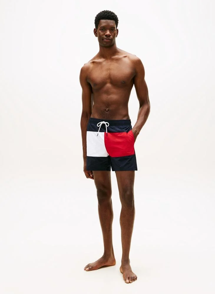 TOMMY HILFIGER  Classic Colour-Blocked Mid Length Swim Shorts for Men | Best Price UAE