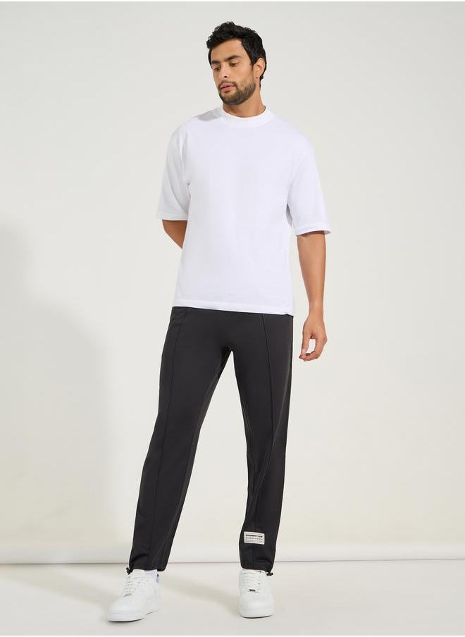 Ultra Soft Slim Pintuck Athleisure Joggers with Badge Detail - pzsku/ZAC8AF659AE1AFB445858Z/45/_/1722620671/803d4ab9-14e9-4ed0-8895-6c6b85b205ab