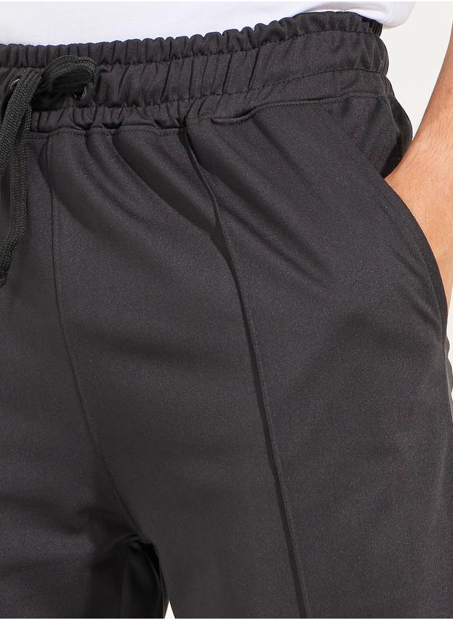 Ultra Soft Slim Pintuck Athleisure Joggers with Badge Detail - pzsku/ZAC8AF659AE1AFB445858Z/45/_/1722620673/a83ce57a-db88-4c97-a4b0-1160f6d1408a