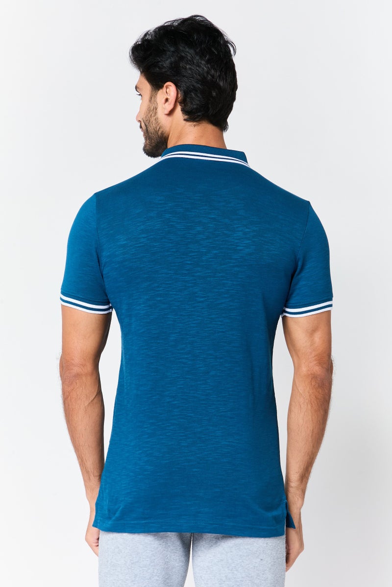 PUMA Men Sportswear Fit Short Sleeve Training Polo Shirt, Blue - Image 4