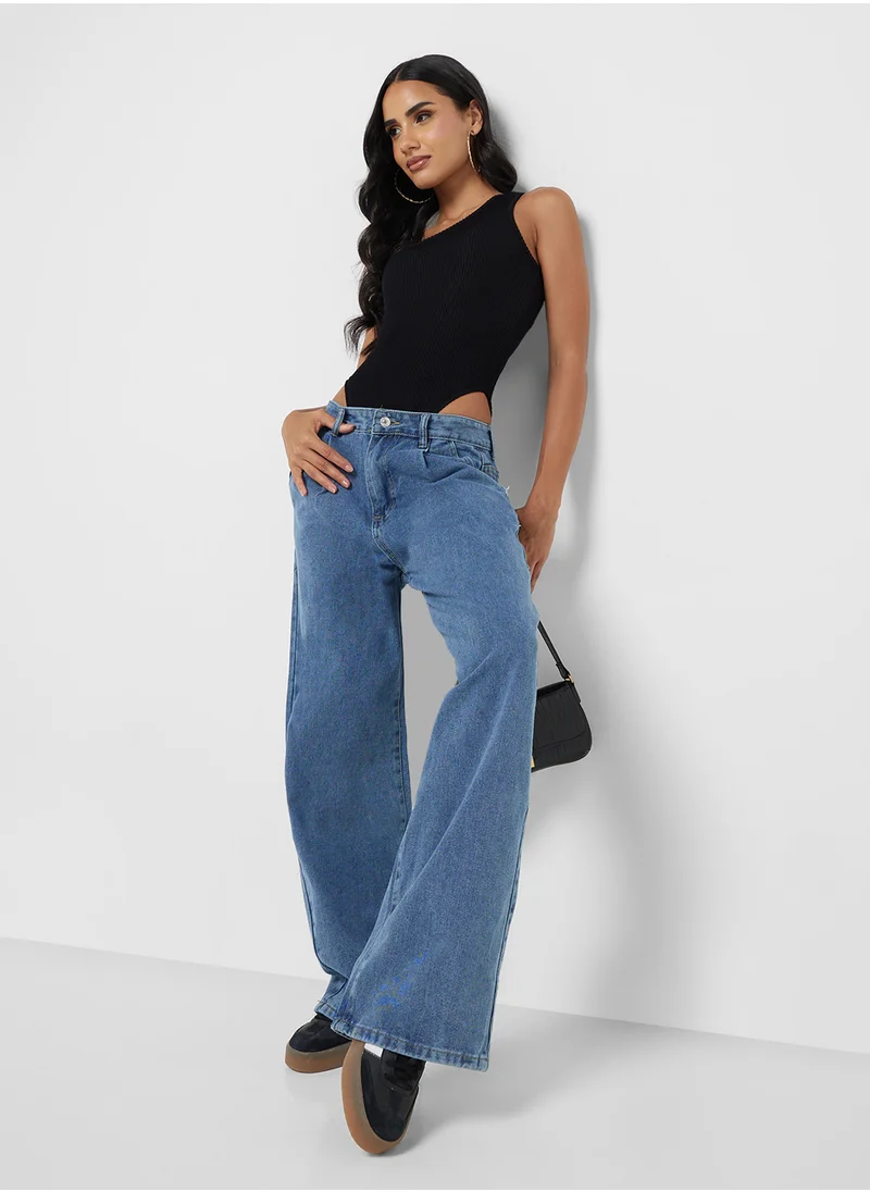 جينجر Mid Rise Flared Jeans With Pleat Detail