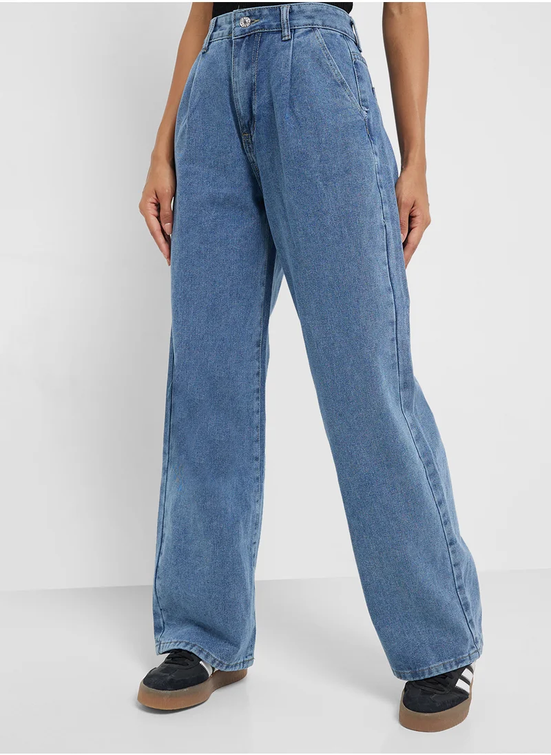 جينجر Mid Rise Flared Jeans With Pleat Detail