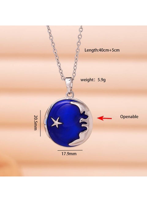A silver stainless steel necklace with a charming moon design in royal blue and a shiny silver star. It features a unique design that opens, allowing you to store a picture or a cherished memory. A one-of-a-kind design that combines elegance and mystery. Perfect for daily wear and special occasions, adding a touch of magic and precious memories to your look.