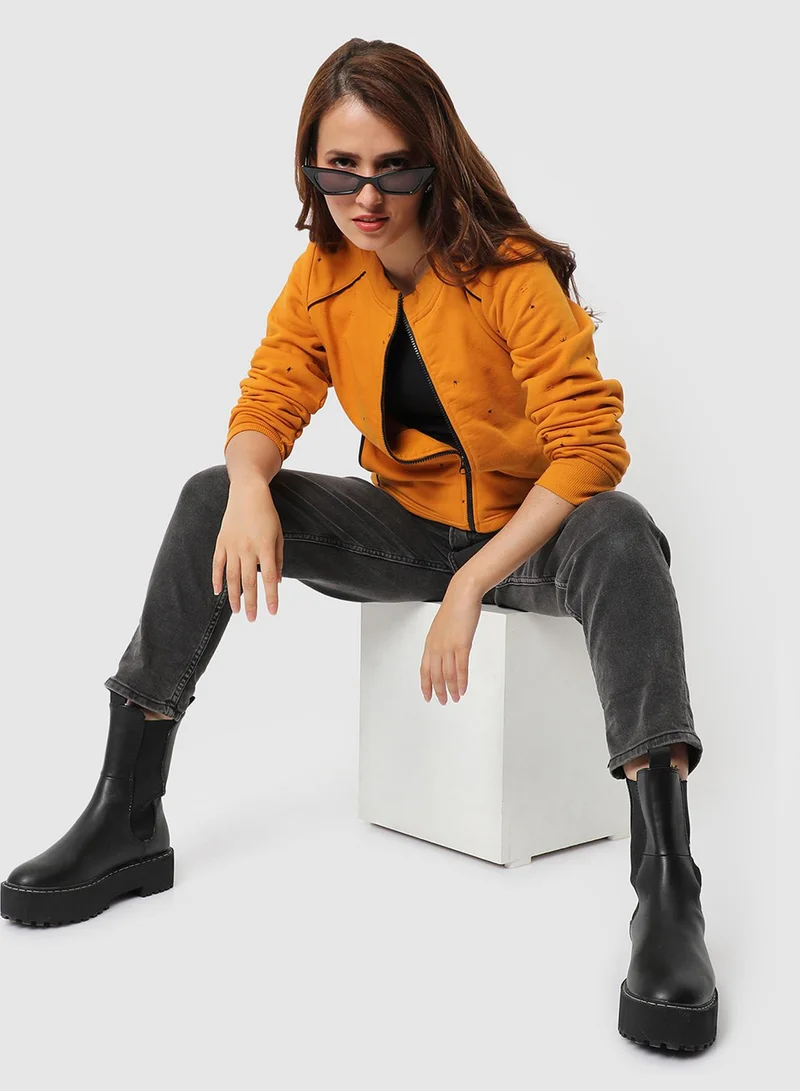 Campus Sutra Women's Yellow Micro Print Hoodie With Contrast Piping For Casual Wear | Low-High Neck | Long Sleeve | Zipper Closure | Cotton Sweatshirt Crafted With Comfort Fit For Everyday Wear