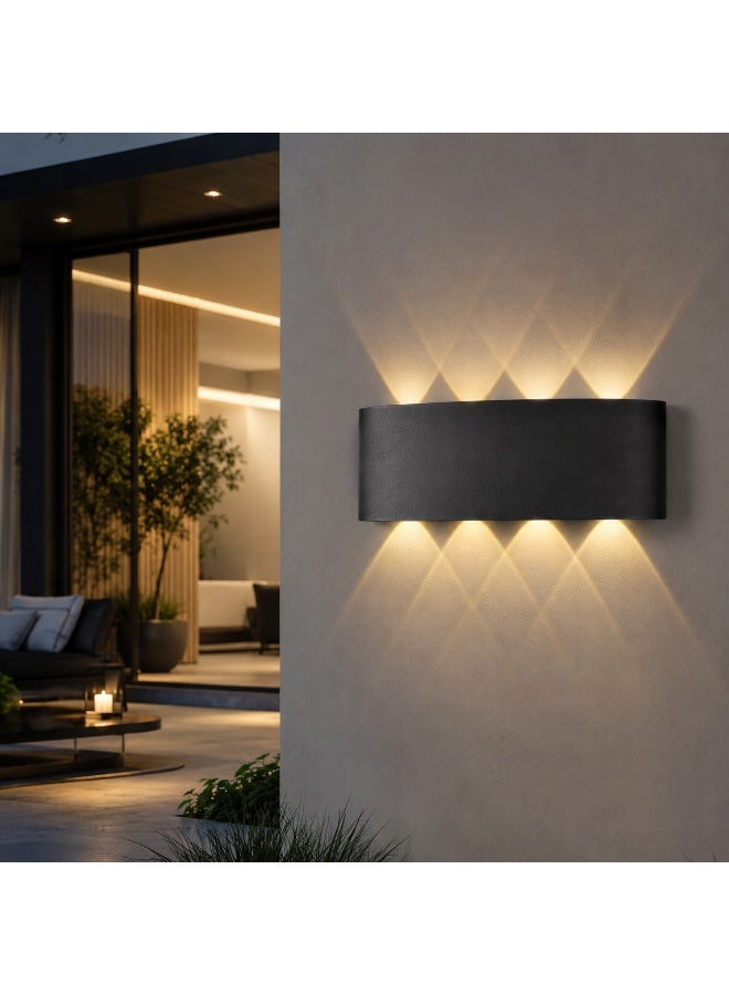 Modern LED wall spotlight with a geometric up and down lighting effect - Image 1