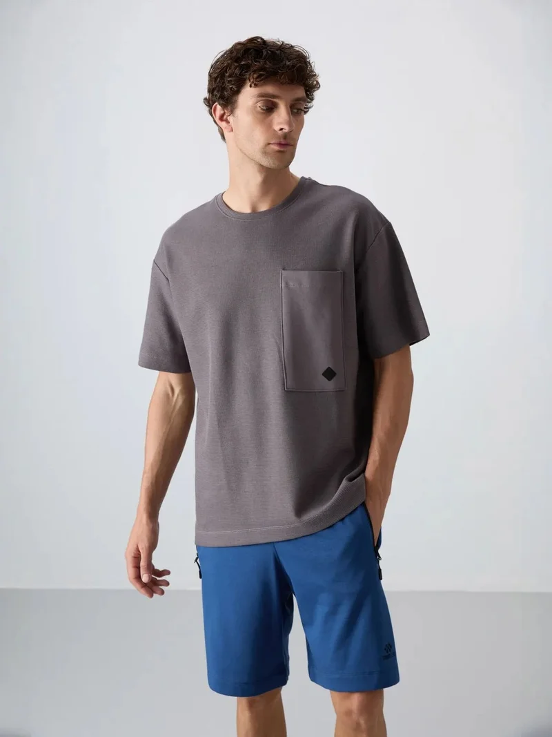تومي لايف TOMMY Oversized Cotton-Blend Crew Neck T-Shirt With Pocket