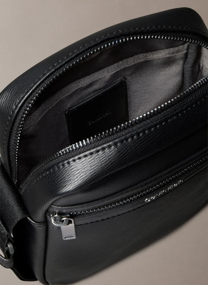 CALVIN KLEIN ZIP REPORTER