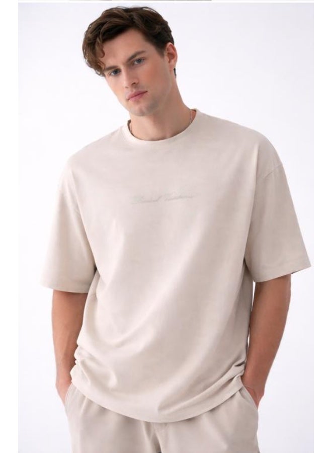 Marrakech Short Sleeve Round Neck T-Shirt - Beige with Front Text Print - Image 1