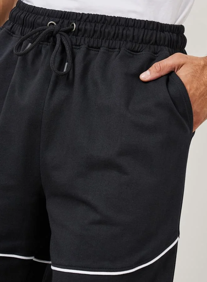 Styli Terry Oversized Shorts with Contrast Piping Detail