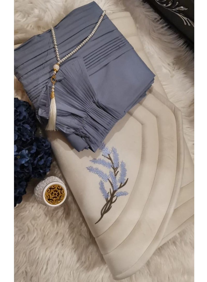 A distinctive and wonderful prayer set consisting of (a prayer rug lined and embroidered with lavender + a prayer dress with wonderful pleats + a rosary of beads) 