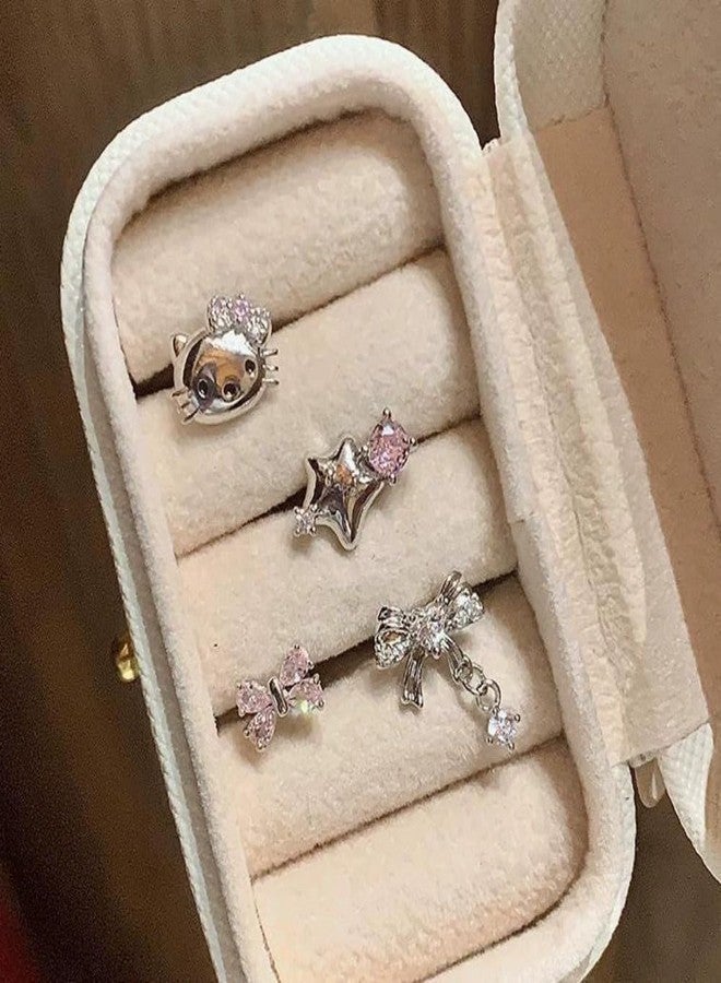 زينوفا مجموعة أقراط زينوفا المكونة من 4 قطع، بتصميمات لطيفة على شكل نجمة وقطة وفيونكة، تُثبّت على غضروف الأذن، ذات ظهر مسطح، للنساء، عيار 20، مرصعة بكريستال الزركونيا المكعب اللامع على شكل فيونكة، أقراط حلزونية أنيقة تُثبّت على غضروف الأذن. - Image 3