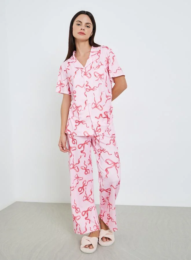 ستايلي طقم بيجاما من بنطال وبلوزة بأزرار وطبعة فيونكة