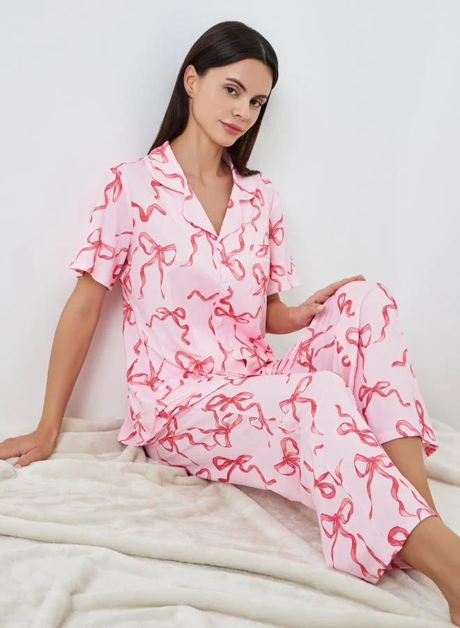 ستايلي طقم بيجاما من بنطال وبلوزة بأزرار وطبعة فيونكة