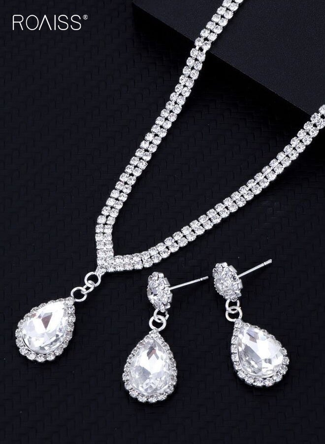 رويس طقم مكون من ثلاث قطع بتصميم دمعة، يشمل قلادة وأقراط وسوار مطاطي. تصميم فاخر مرصع بالكامل بالألماس، مثالي للعرائس والمناسبات الرسمية. متعدد الاستخدامات وأنيق، مثالي لحفلات الزفاف والمناسبات الرسمية. - Image 4