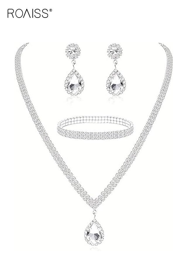 رويس طقم مكون من ثلاث قطع بتصميم دمعة، يشمل قلادة وأقراط وسوار مطاطي. تصميم فاخر مرصع بالكامل بالألماس، مثالي للعرائس والمناسبات الرسمية. متعدد الاستخدامات وأنيق، مثالي لحفلات الزفاف والمناسبات الرسمية. - Image 3