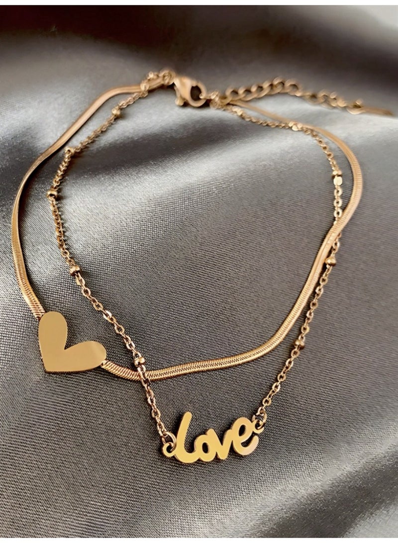 ڤيا خلخال فاخر مزدوج الطبقات من فولاذ التيتانيوم عالي الجودة، مطلي بذهب 18K ومصمم بلمسة LOVE أنيقة لا يتغير لونها مع الوقت. - Image 3