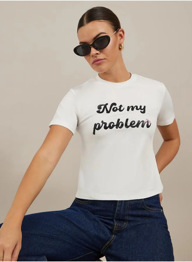 Styli Slogan Print Round Neck Crop T-Shirt