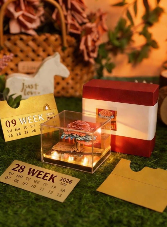 HIOUME تقويم 3D الإبداعي لقطعة الزمن 2026 زينة تقويم أسبوعي مكتبي مع ضوء LED وحافظة أكريليك، ملاحظات غير لاصقة من الورق، فن نحت الورق هدية عيد الميلاد (منزل الشجرة) - Image 2