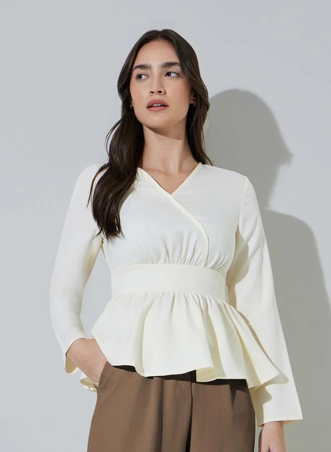 ستايلي Off White Solid Ruffled Details V-Neck Peplum Blouse
