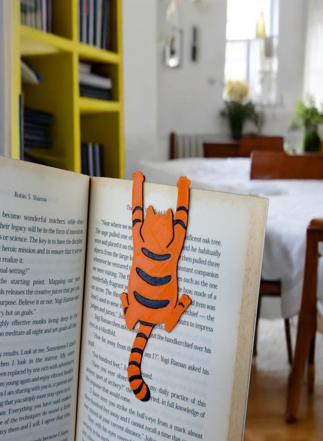 فاصل كتب بلاستيكي ثلاثي الأبعاد بتصميم قطط مضحك، عبوة من قطعتين (أبيض وبرتقالي) - Image 1