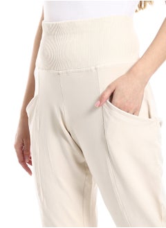 Beige elastic waist trousers - pzsku/ZAD60B3A08122184E74F5Z/45/_/1710105935/7cd82c93-a684-4fa1-9ef4-24c9bccd7ca3