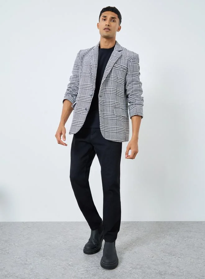 ستايلي معطف واسع بمظهر تويد مطبع بمربعات