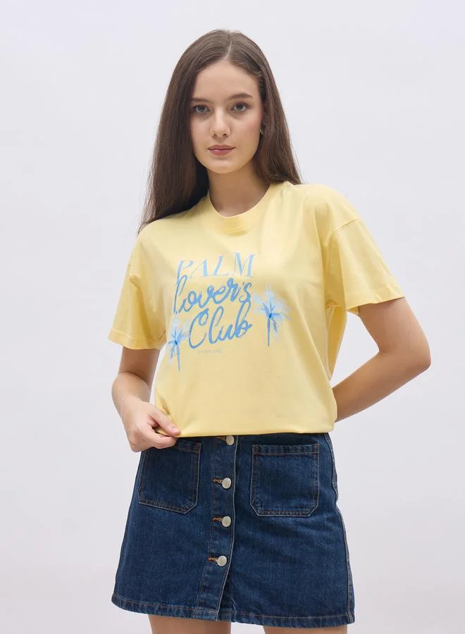 ستايلي Styli Yellow Palm Club Graphic Regular Fit T-Shirt