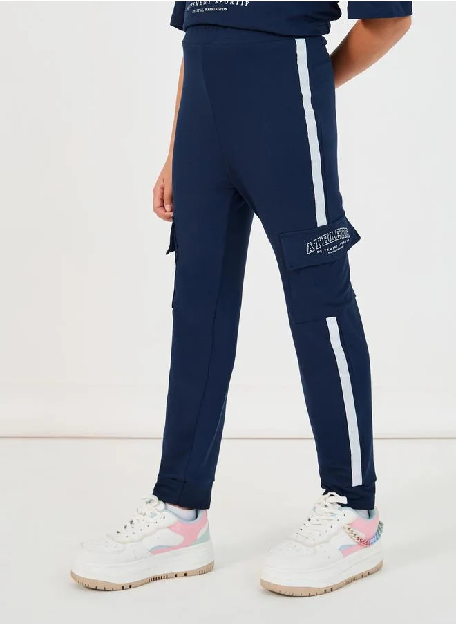 Styli Graphic Print V-Neck T-Shirt & Tape Detail Cargo Joggers Co-Ords