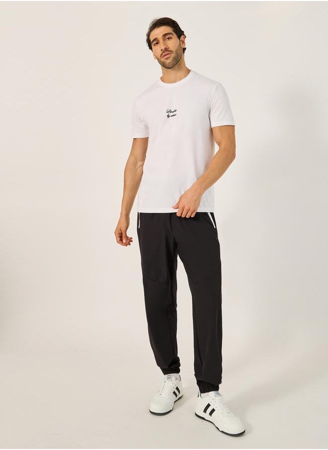 Styli - Solid Relaxed Fit Elasticated Cuff Joggers with Contrast Zip detail - Image 1