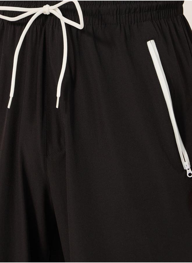 Styli - Solid Relaxed Fit Elasticated Cuff Joggers with Contrast Zip detail - Image 1