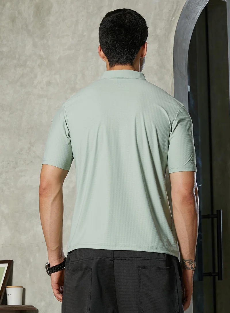 Campus Sutra Campus Sutra Men's Saltbox Beige Seamless Cuboid Polo T-Shirt For Casual Wear | Polo Neck | Short Regular Sleeves | Half-Button Closure | T-Shirt Crafted With Comfort Fit For Everyday Wear