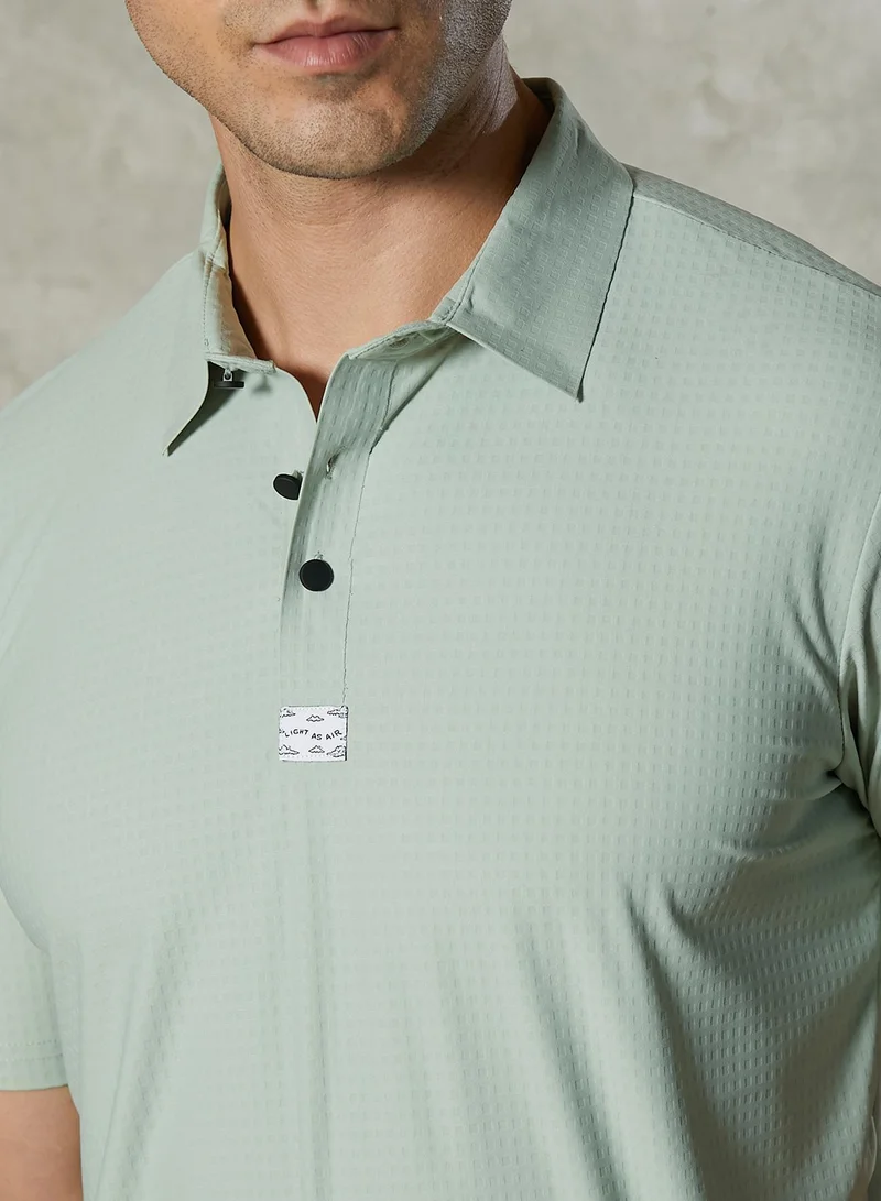 Campus Sutra Campus Sutra Men's Saltbox Beige Seamless Cuboid Polo T-Shirt For Casual Wear | Polo Neck | Short Regular Sleeves | Half-Button Closure | T-Shirt Crafted With Comfort Fit For Everyday Wear