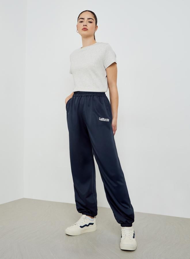 Styli Navy Blue Slogan Printed Wide Leg Joggers - Image 5
