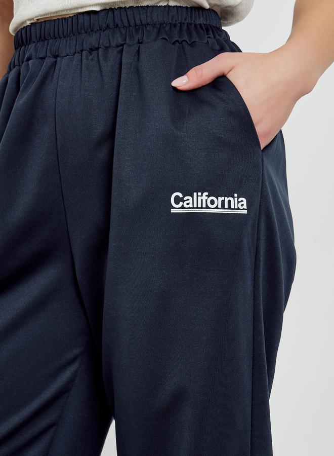 Styli Navy Blue Slogan Printed Wide Leg Joggers - Image 3