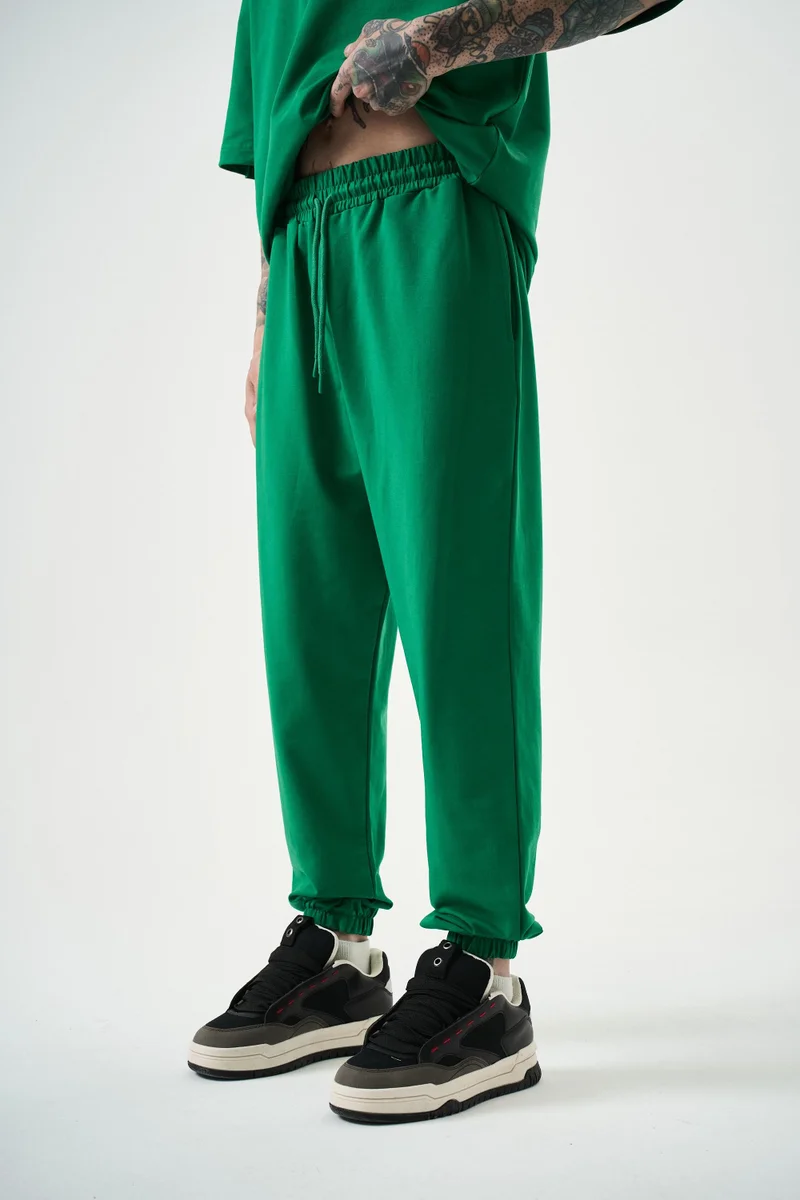 ريسباير بنطلون رياضي جوغر (Jogger) رجالي أساسي، بينيتون (أخضر داكن)