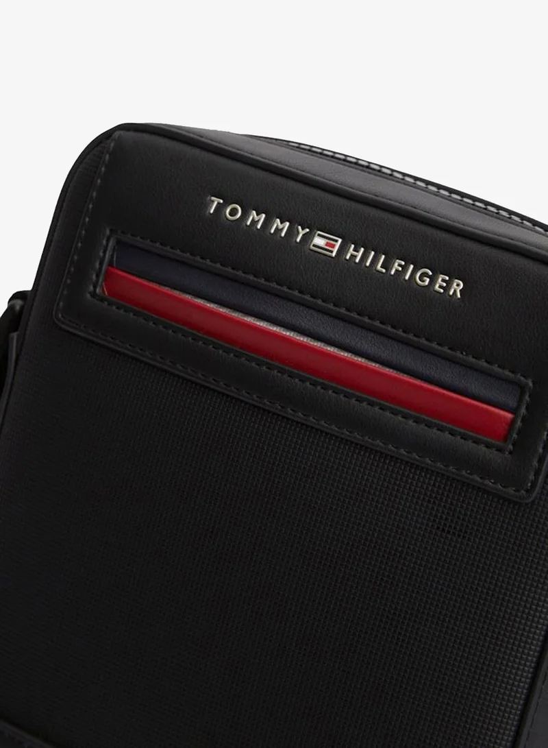 Tommy Hilfiger  Metal Logo Crossbody Reporter Bag for Men | Best Price UAE