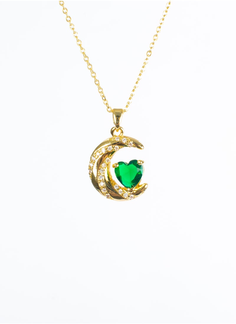 The Black Pearl Accessories - Stainless Steel  Necklace Gold with a Zirconic Cresent and Green Crystal Heart Pendant - Image 1