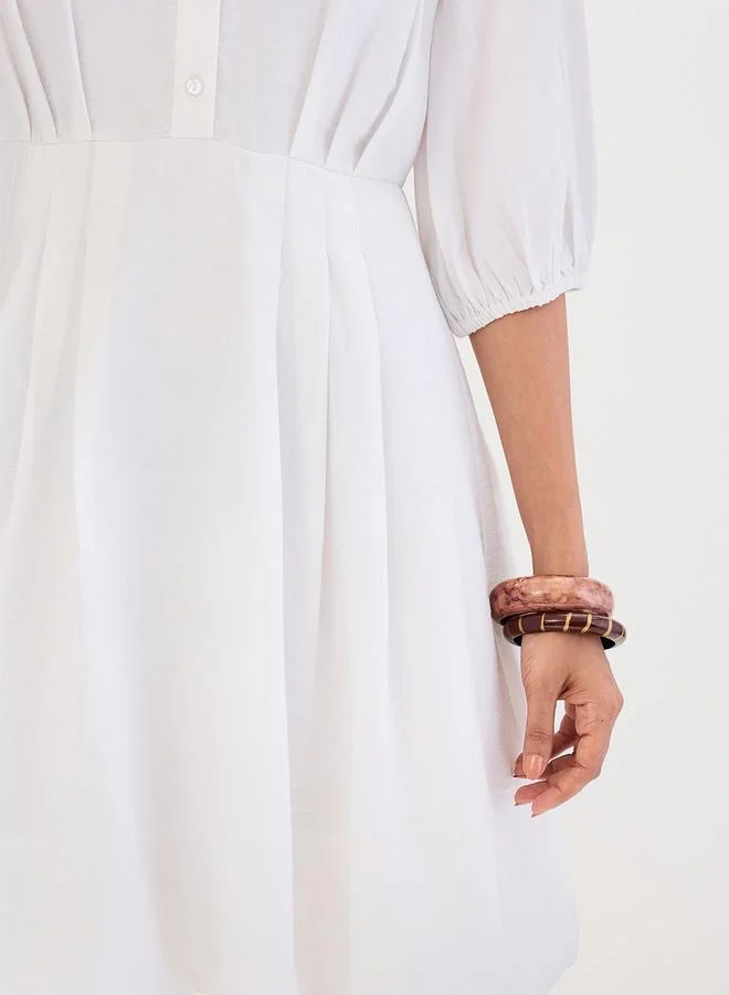 Femmella  White Shirt Mini Dress with Fold Pleat Detail for Women | Best Price UAE