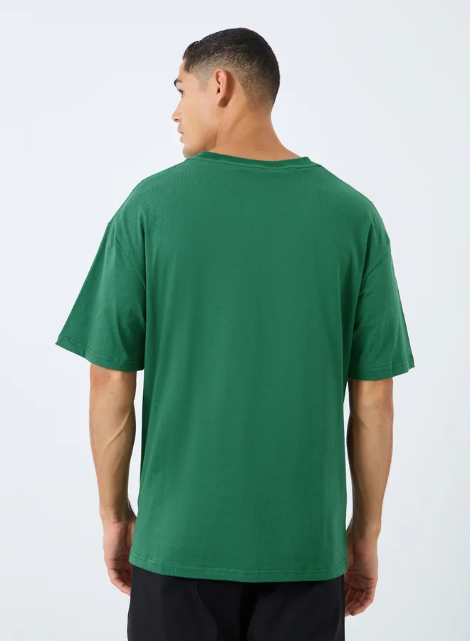 Styli Styli Men Oversized Emboss Print T-Shirt