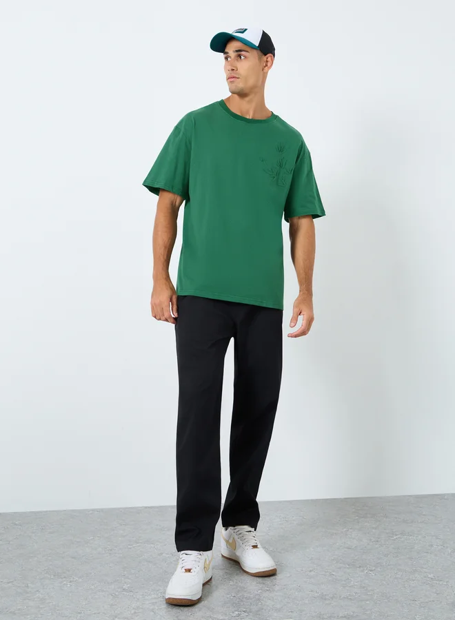 ستايلي Styli Men Oversized Emboss Print T-Shirt