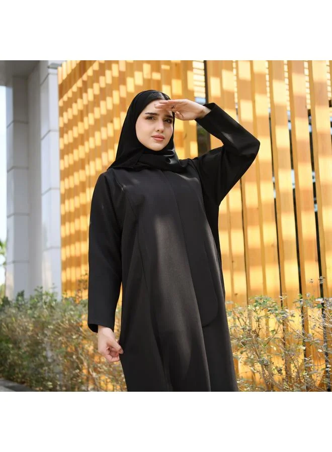 HAWRAA ABAYA Black abaya with formal design and side piece that closes with hidden buttons