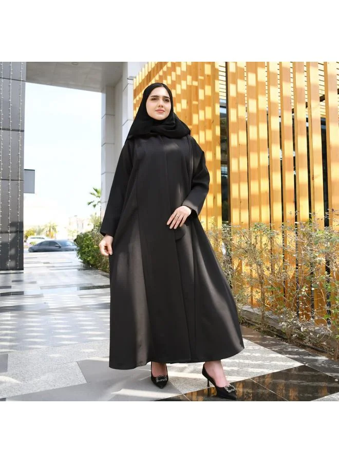 HAWRAA ABAYA Black abaya with formal design and side piece that closes with hidden buttons