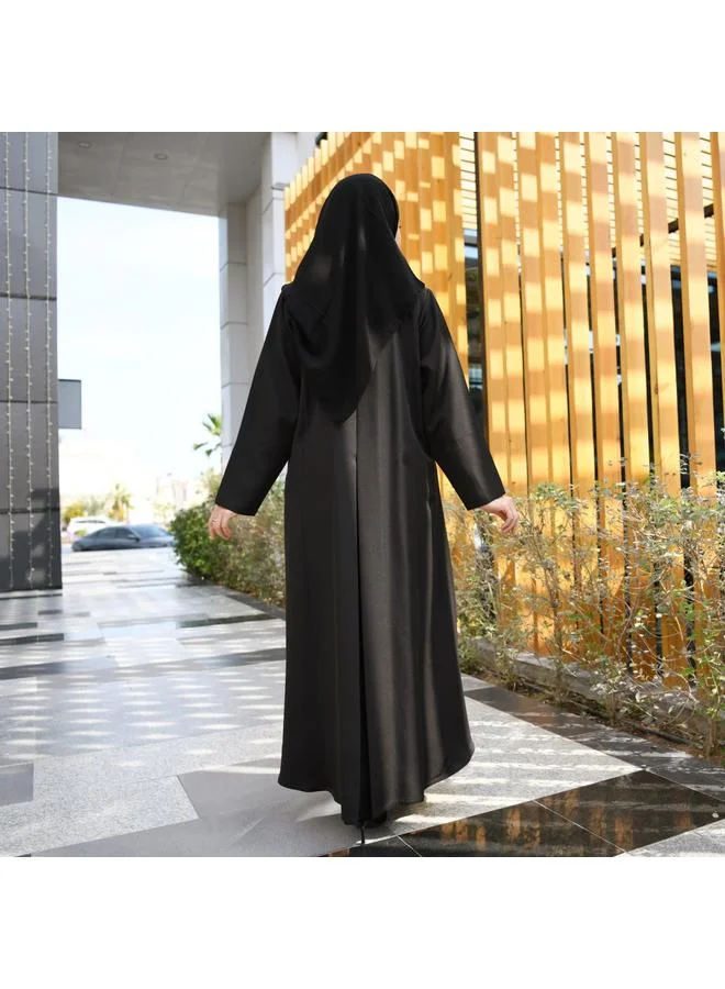 HAWRAA ABAYA Black abaya with formal design and side piece that closes with hidden buttons