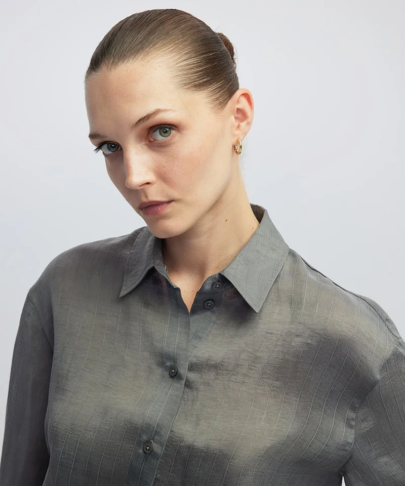 ابيكول Adjustable Back Hem Shirt