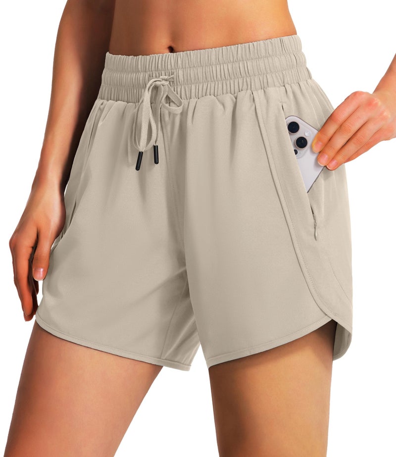 Ksmien Women's 5"/ 7" Athletic Running Shorts Quick Dry Lightweight Workout Gym Shorts with Zipper Pockets UPF 50+ Khaki - Image 1