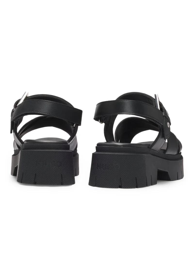 هوجو صنادل جلد بحزام مشبك ونعل سميك