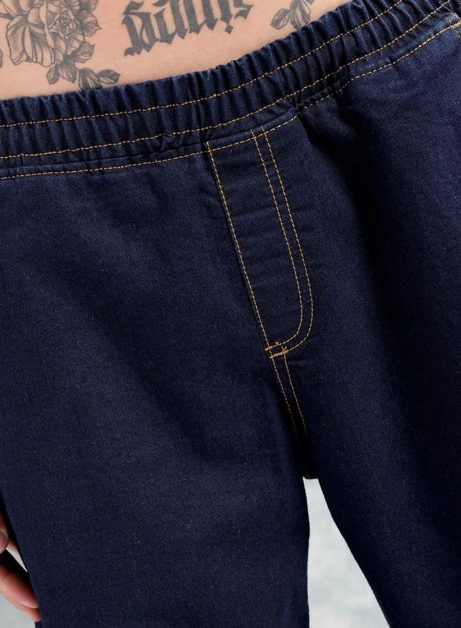 The Indian Garage Co Men Loose Fit Solid Mid-Rise Stretchable Denim Joggers